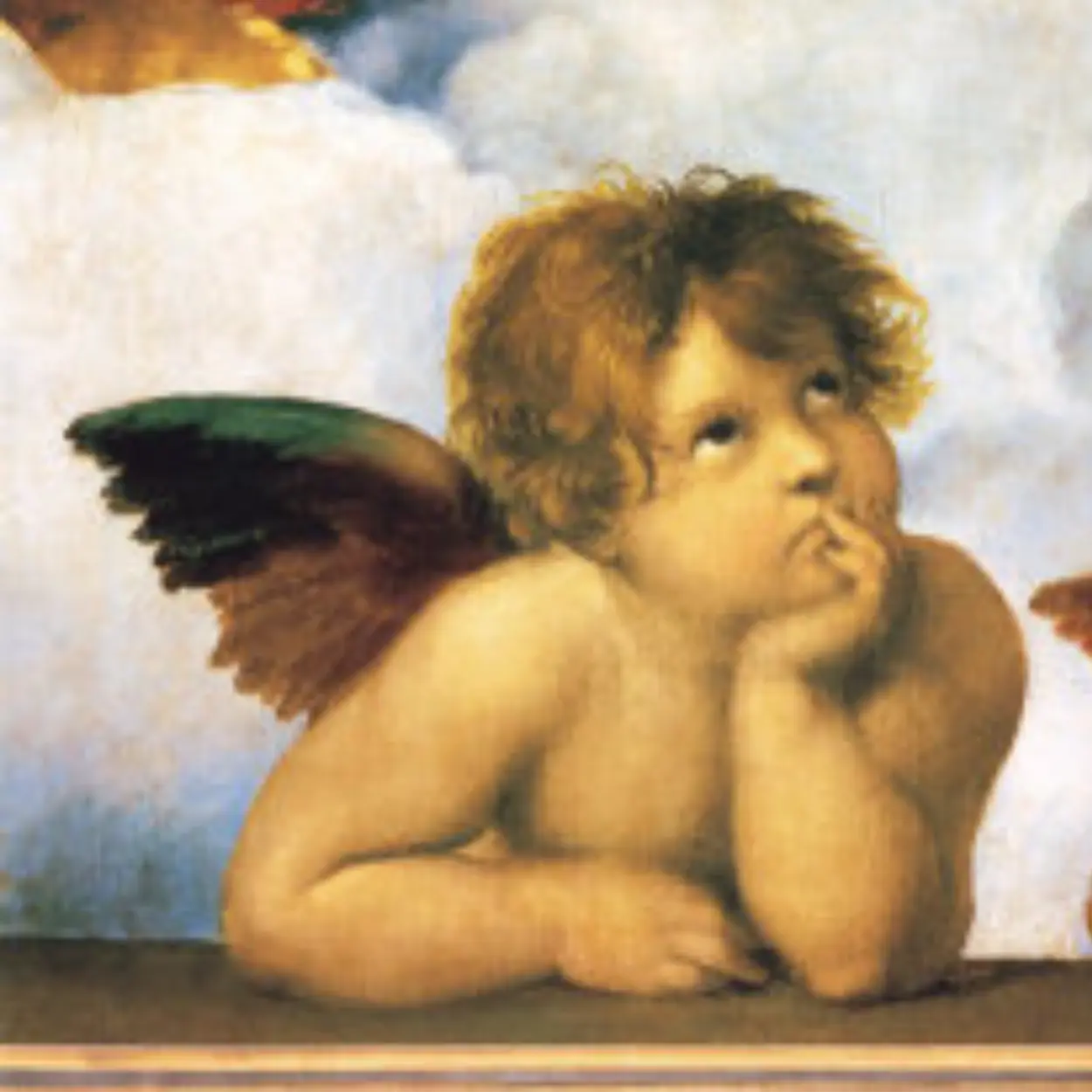 Detail of a Renaissance cherub resting on a ledge